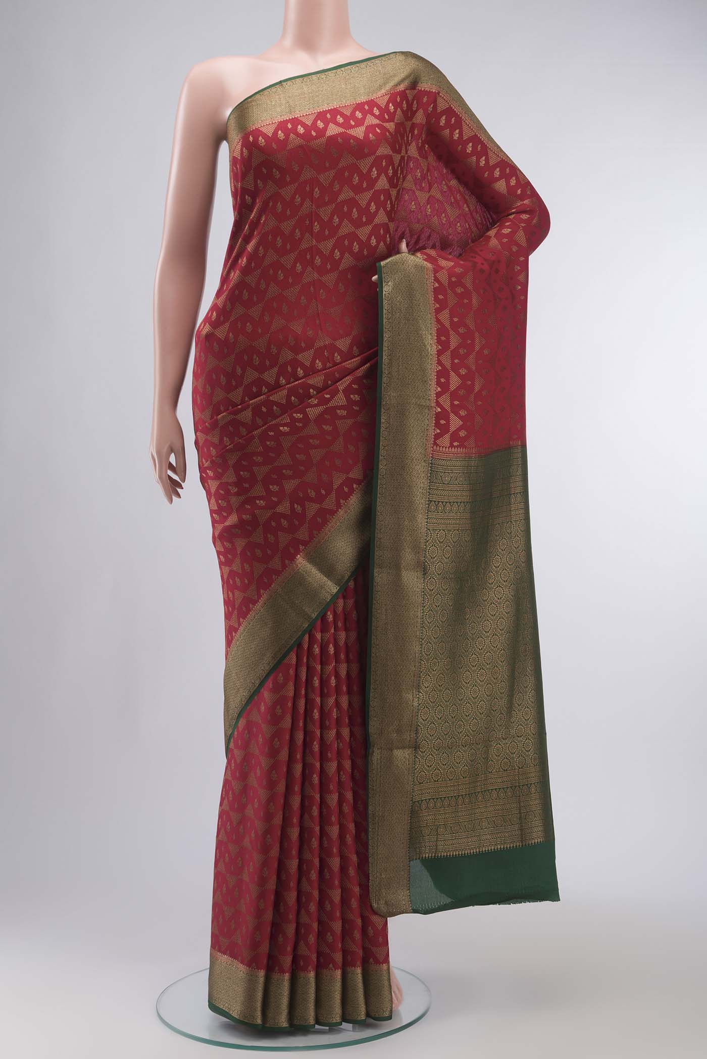 Maroon Mysore Crepe Saree with Zari Brocade on the body and Zari Border displayed on a mannequin