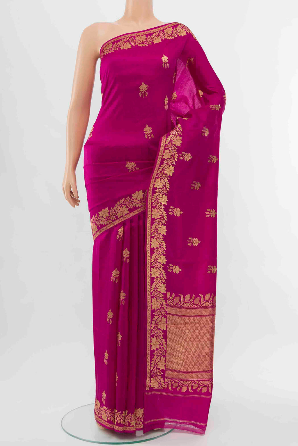 Magenta Banarasi Katan Silk Saree with Zari Butta on the body and Zari Border displayed on a mannequin