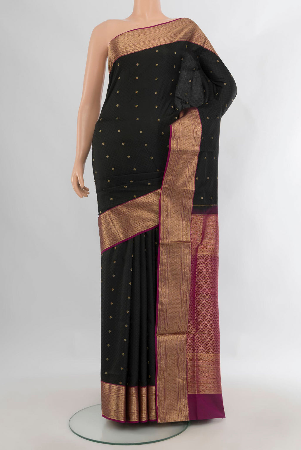 Pure Silk Black Soft Saree with Jacquard design on the body and Zari Border.  displayed on a mannequin