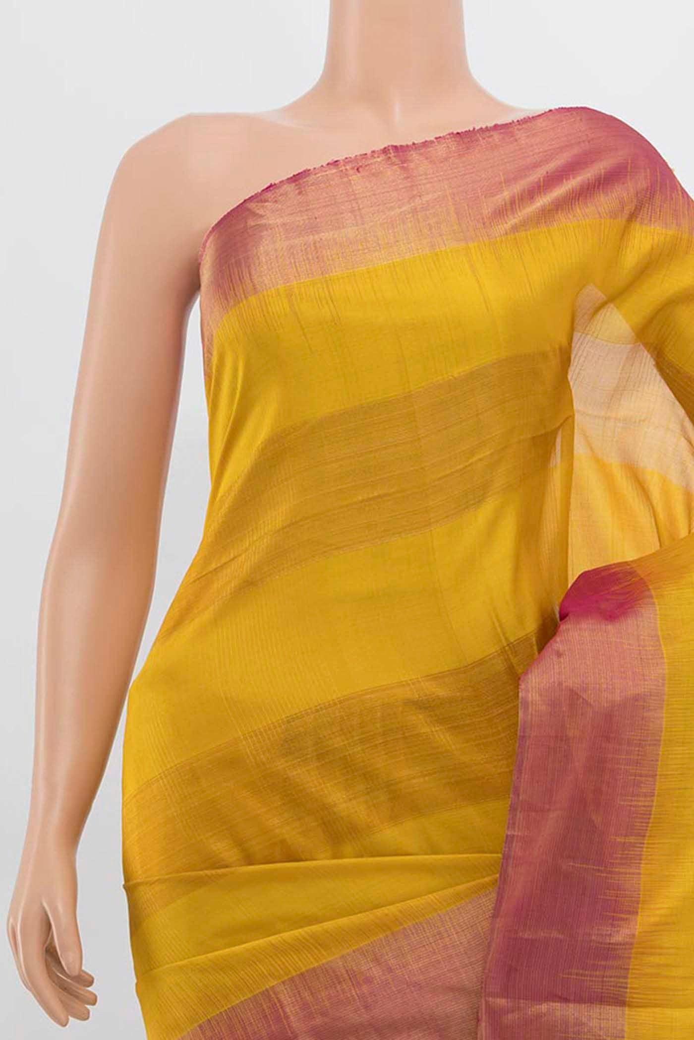 Border image of Mustard Soft Silk Saree with Zari Butta on the body and Silk Border
