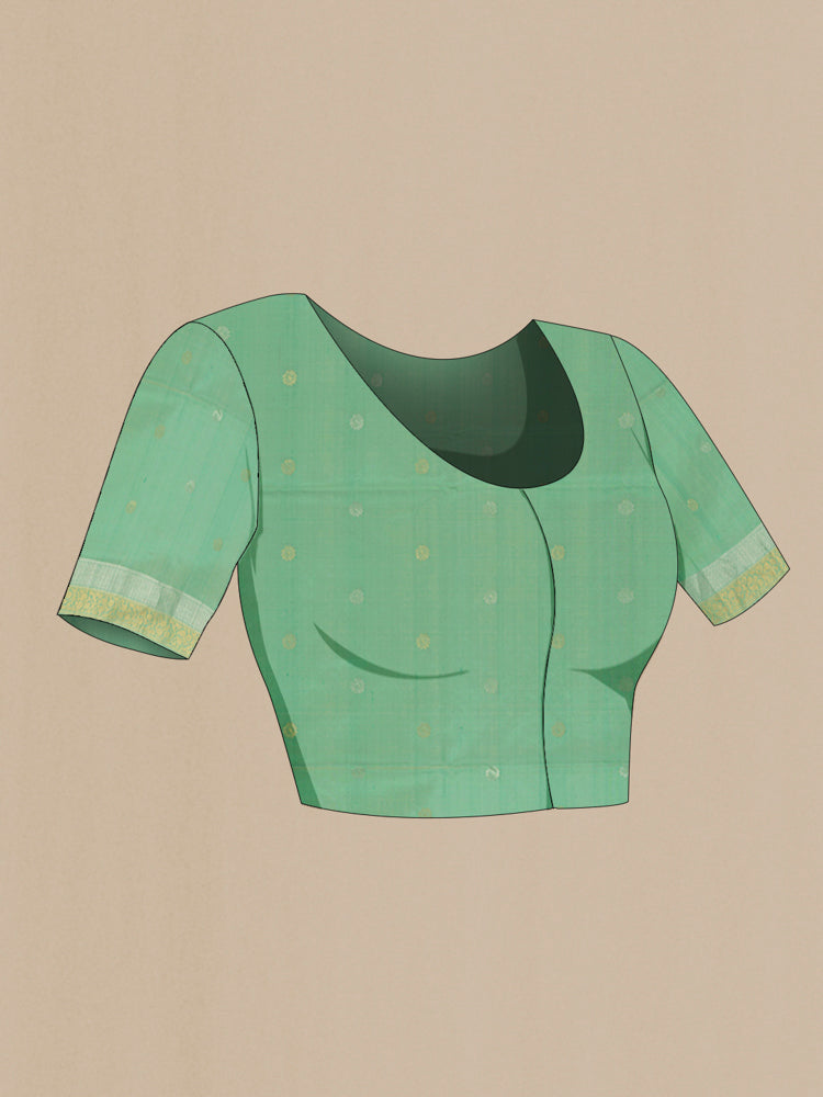 Close up image of the blouse of Light Green Soft Silk Saree with Zari Butta on the body and Silk Border. 