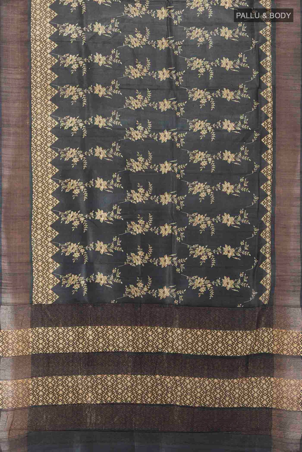 Flat view of Grey Tussar Silk Saree with Floral Print on the body and Silk Border