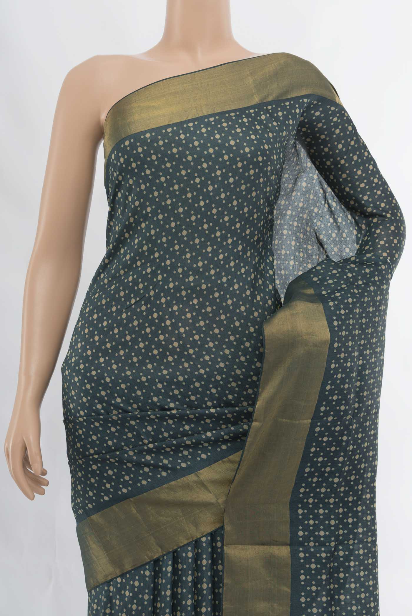 Border image of Navy Blue Tussar Silk Saree with Floral Print on the body and Silk Border. 