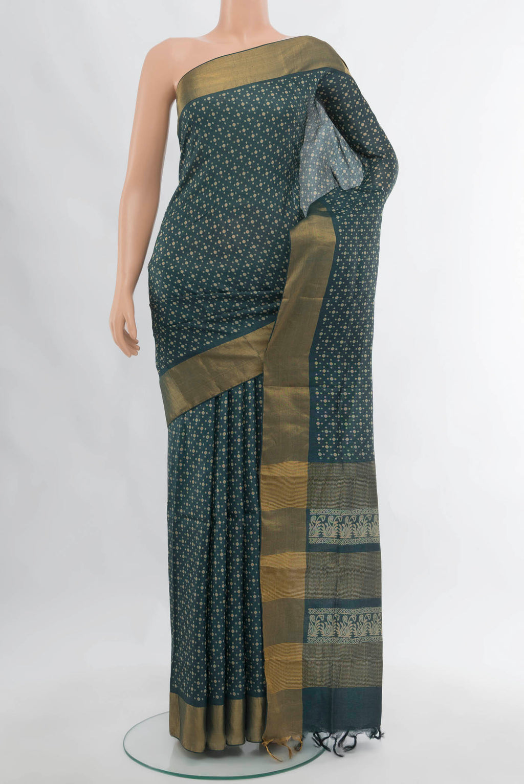 Navy Blue Tussar Silk Saree with Floral Print on the body and Silk Border.  displayed on a mannequin