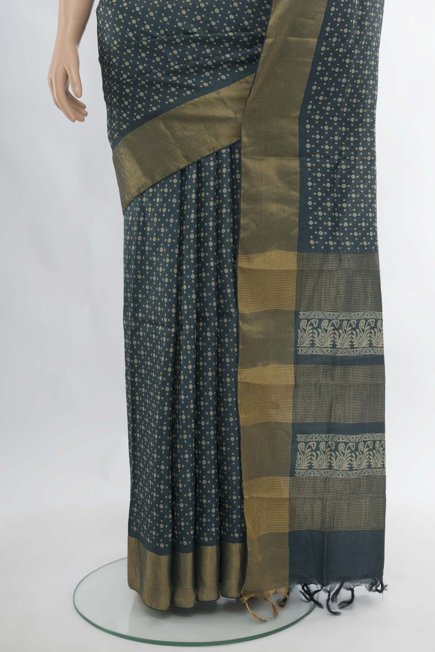 Pleats and pallu of Navy Blue Tussar Silk Saree with Floral Print on the body and Silk Border. 