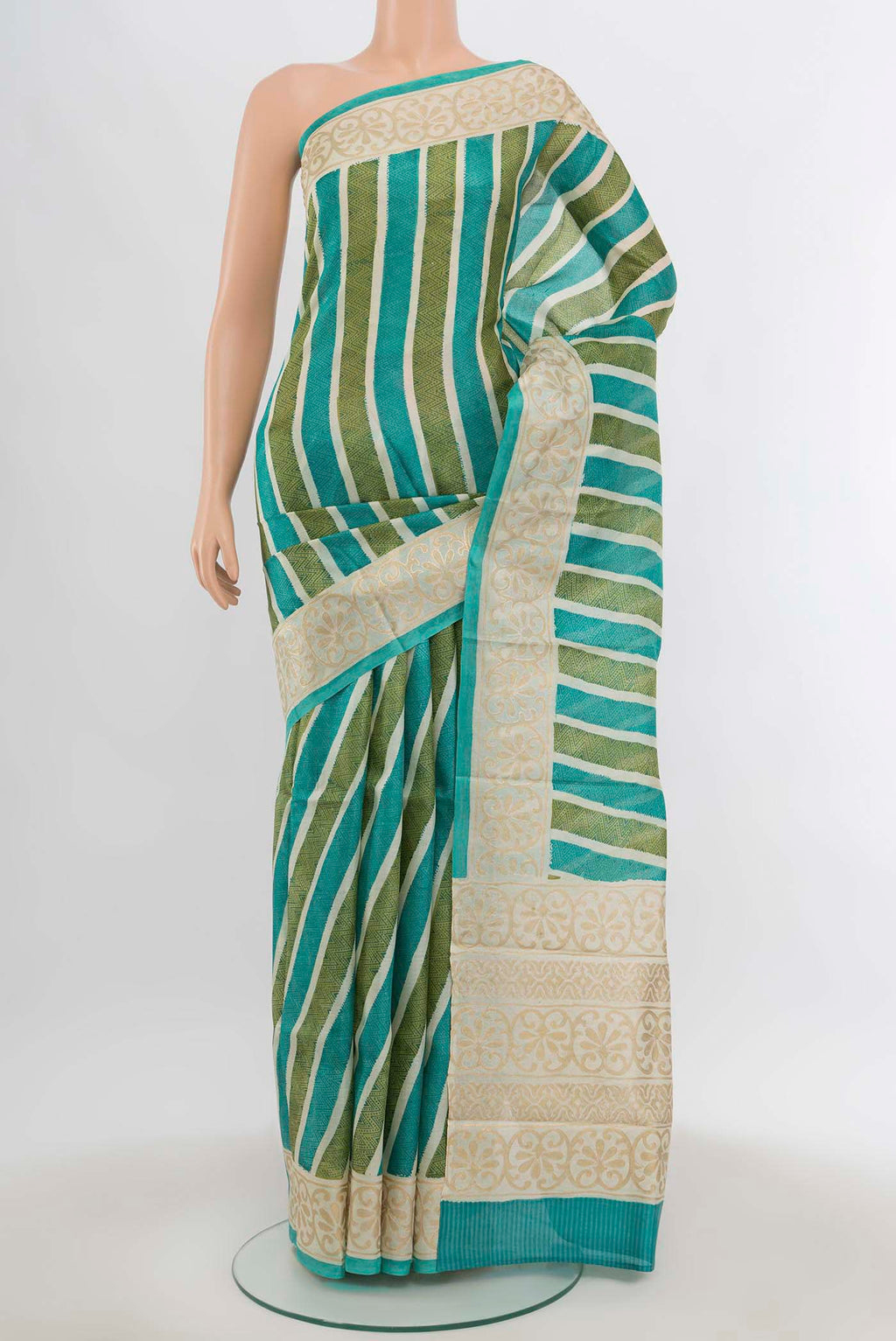 Multi Color Tussar Silk Saree with Floral Print on the body and Silk Border.  displayed on a mannequin