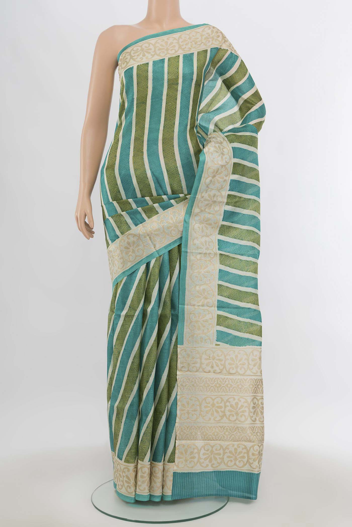 Multi Color Tussar Silk Saree with Floral Print on the body and Silk Border.  displayed on a mannequin