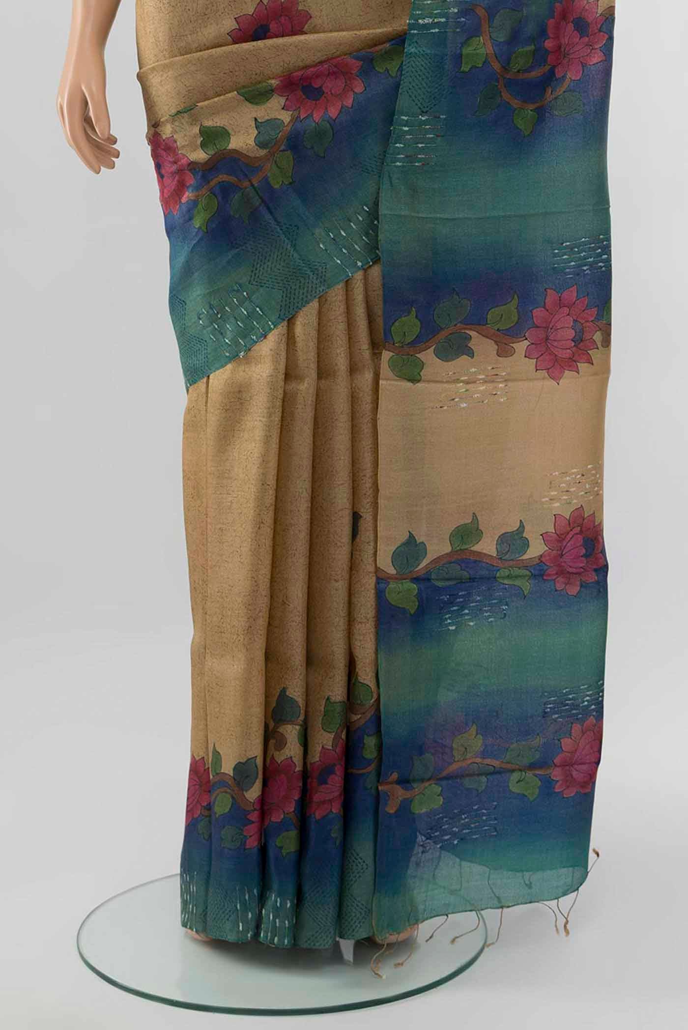 Pleats and pallu of Beige Tussar Silk Saree with Floral Print on the body and Silk Border
