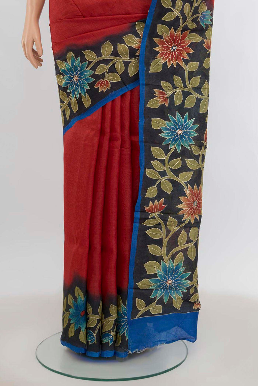 Pleats and pallu of Peach Tussar Silk Saree with Floral Print on the body and Silk Border. 