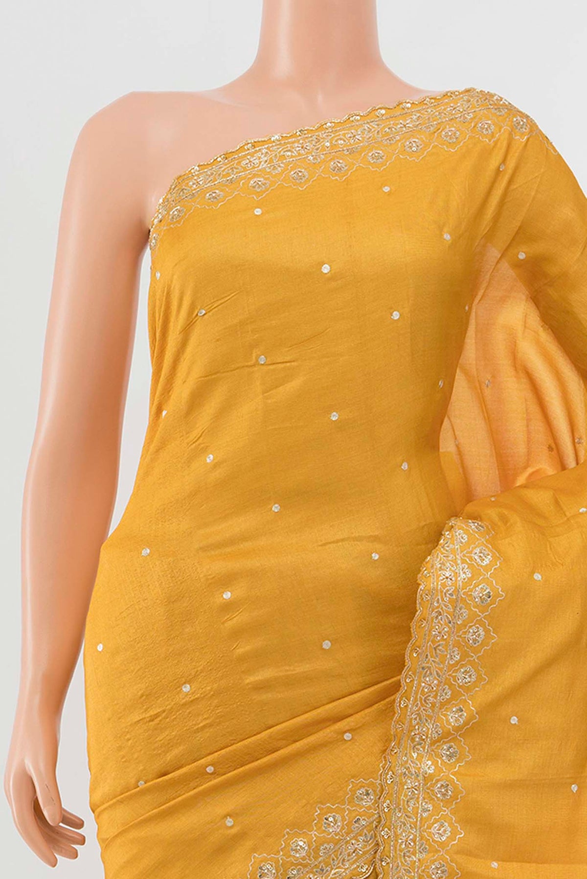 Border image of Yellow Tussar Silk Saree with Zari Butta on the body and Silk Border