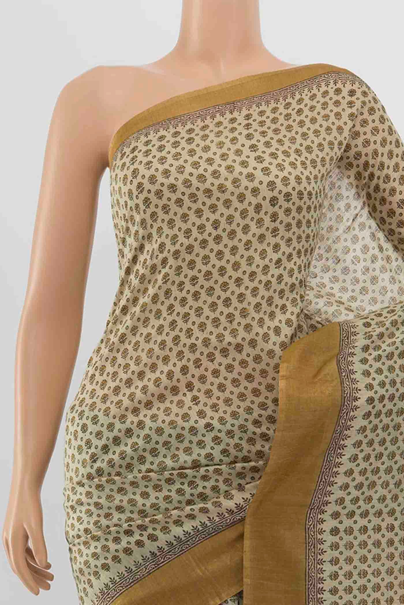 Border image of Beige Tussar Silk Saree with Floral Print on the body and Silk Border