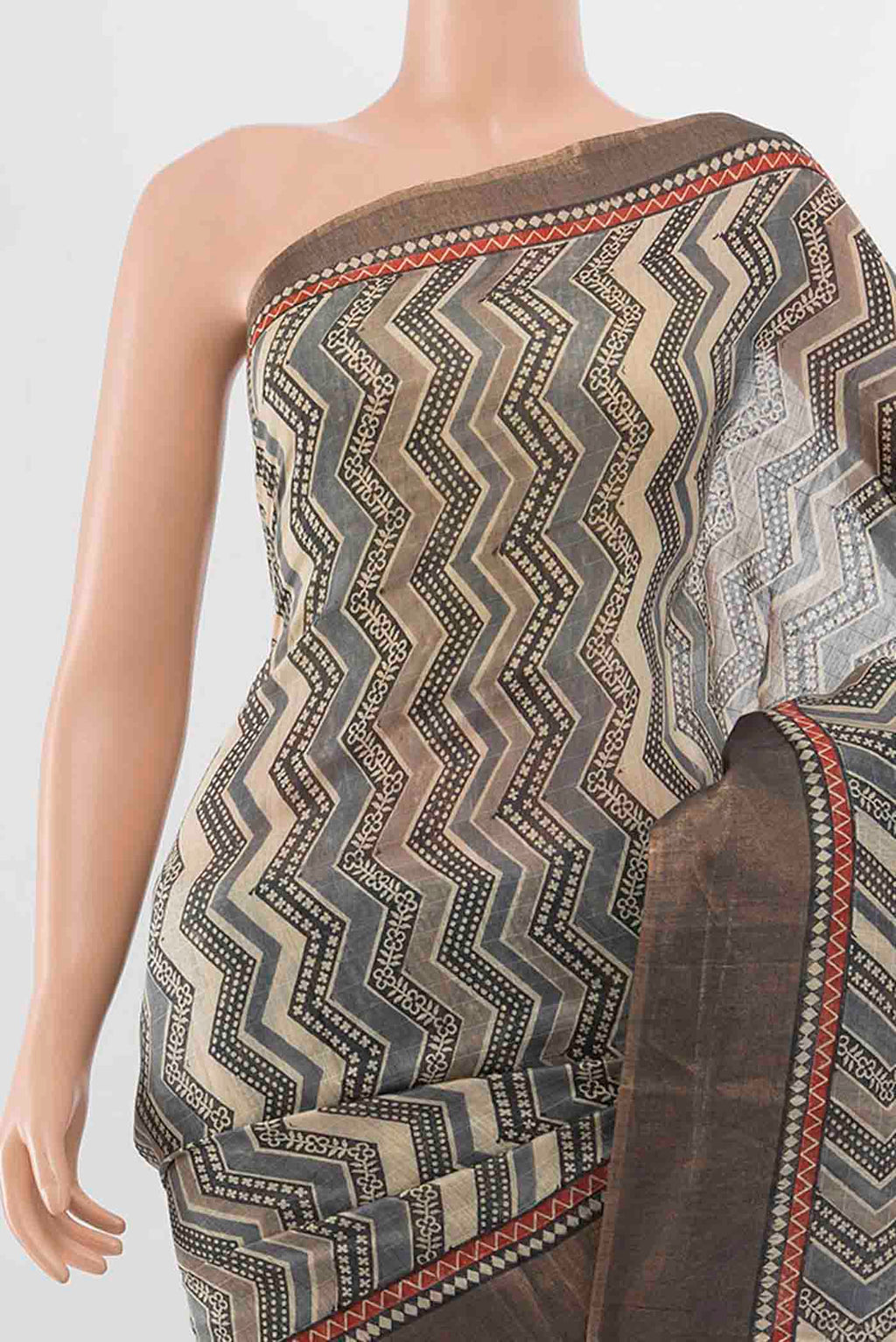 Border image of Grey Tussar Silk Saree with Geometric Print on the body and Zari Border