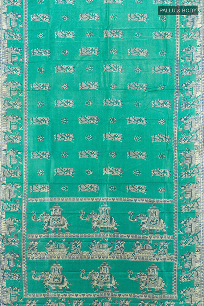 Flat view of Light Blue Tussar Saree with Floral Print on the body and Silk Border. 
