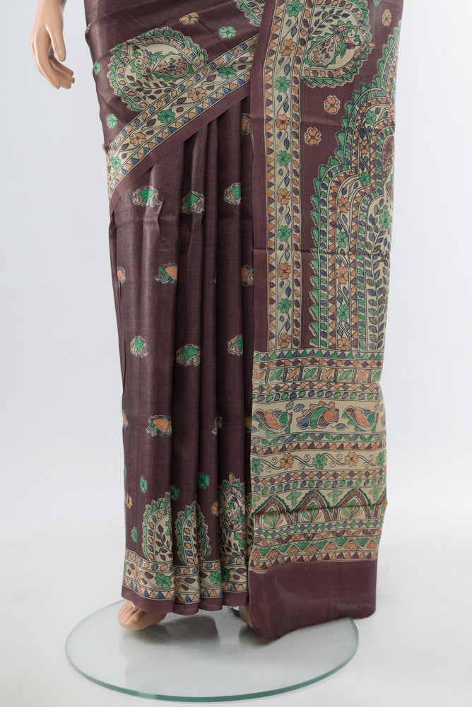 Pleats and pallu of Brown Tussar Silk Saree with Floral Print on the body and Silk Border. 