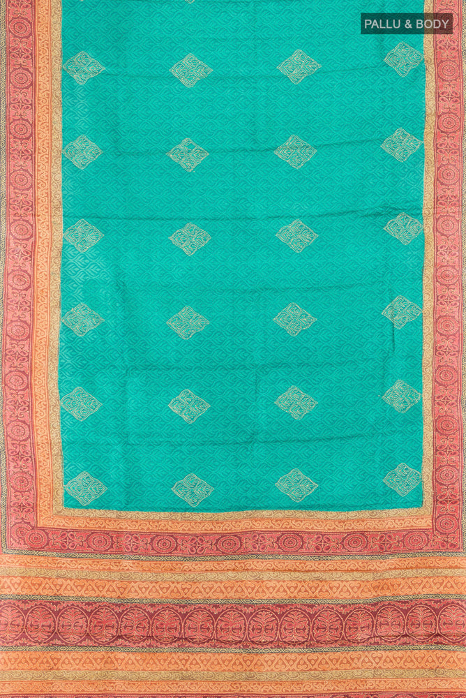 Flat view of Peacock Blue Tussar Silk Saree with Floral Print on the body and Thread Border. 