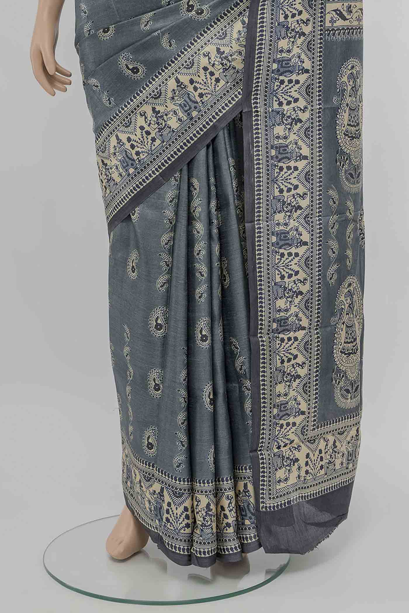 Pleats and pallu of Grey Tussar Saree with Printed design on the body and Fancy Border