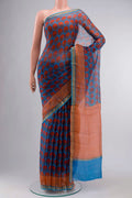Blue Kota Silk Saree With Printed design on the body and Zari Border displayed on a mannequin