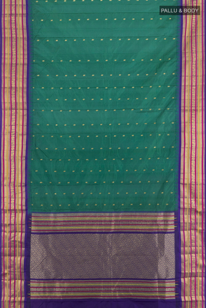 Flat view of Peacock Blue Bangalore Silk Saree with Zari Butta on the body and Silk Border. 