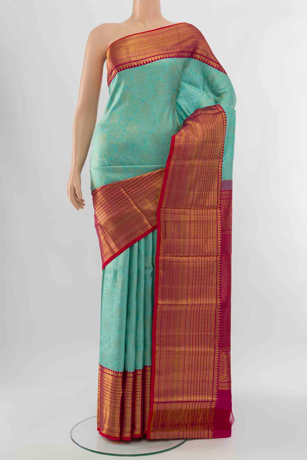 Sky Blue Kanchipuram Silk Saree with Zari Brocade on the body and Silk Border displayed on a mannequin