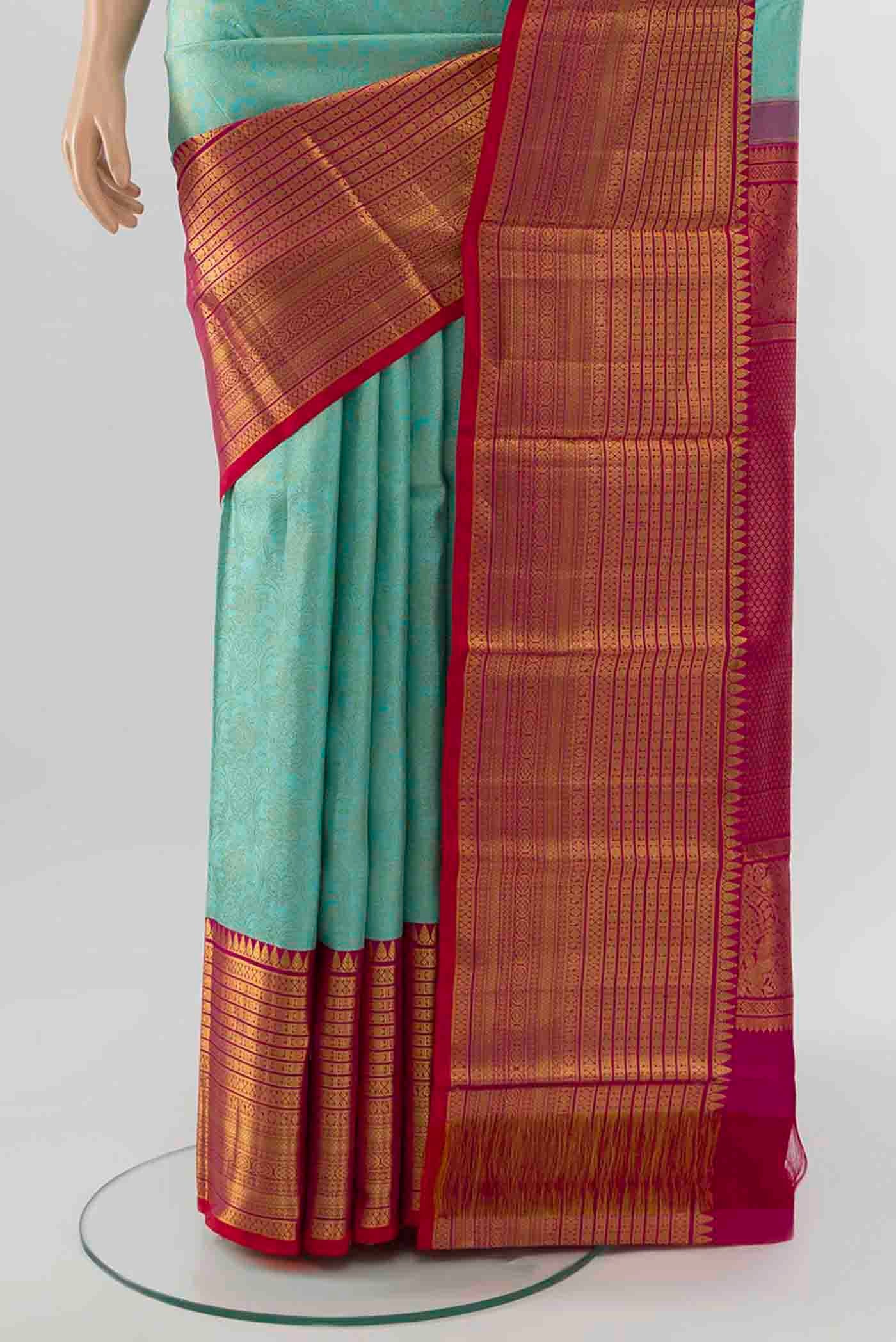 Pleats and pallu of Sky Blue Kanchipuram Silk Saree with Zari Brocade on the body and Silk Border