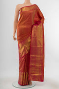 Pure Silk Pure Zari Pink Kanchipuram Saree with Zari Butta on the body and Silk Border displayed on a mannequin