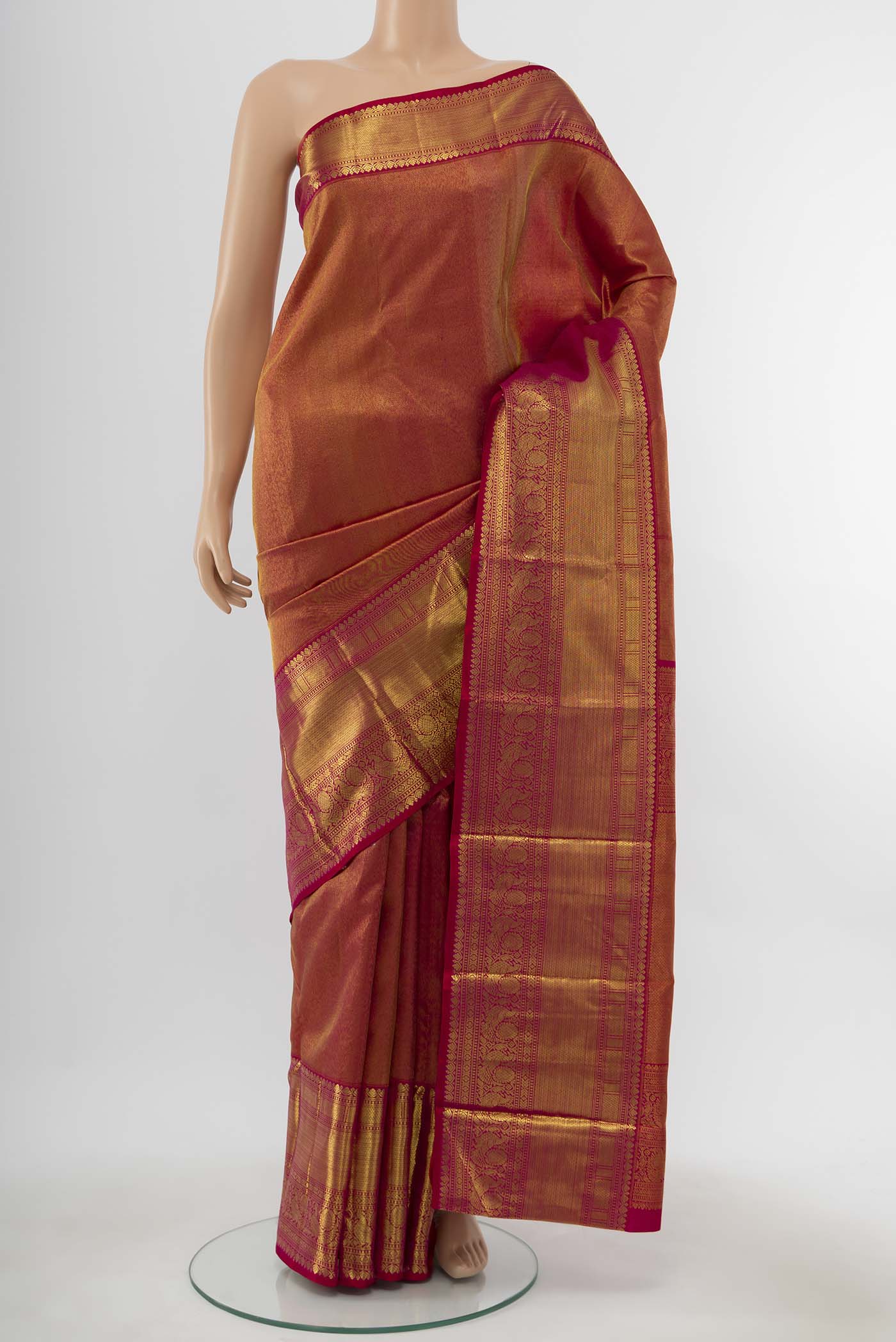 Pure Silk Pure Zari Pink Kanchipuram Saree with Zari Butta on the body and Silk Border displayed on a mannequin