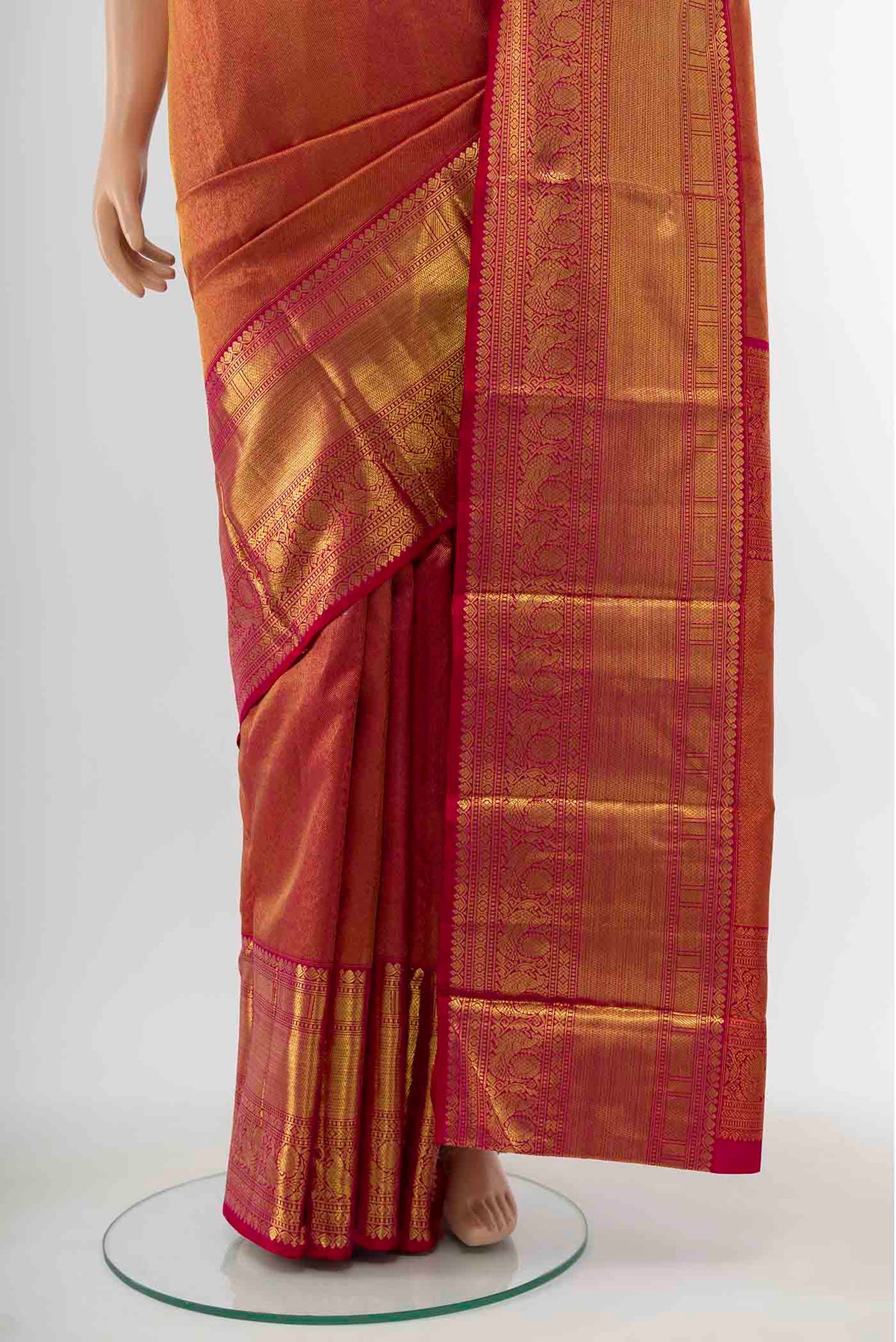 Pleats and pallu of Pure Silk Pure Zari Pink Kanchipuram Saree with Zari Butta on the body and Silk Border