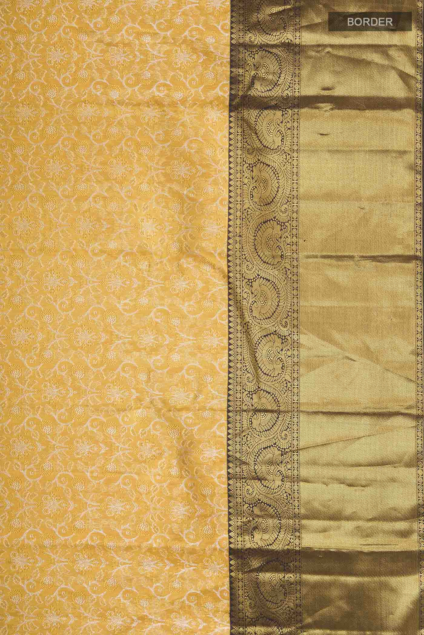 Border image of Pure Silk Pure Zari Yellow Kanchipuram Saree with Zari Brocade on the body and Zari Border