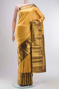 Pure Silk Pure Zari Yellow Kanchipuram Saree with Zari Brocade on the body and Zari Border displayed on a mannequin