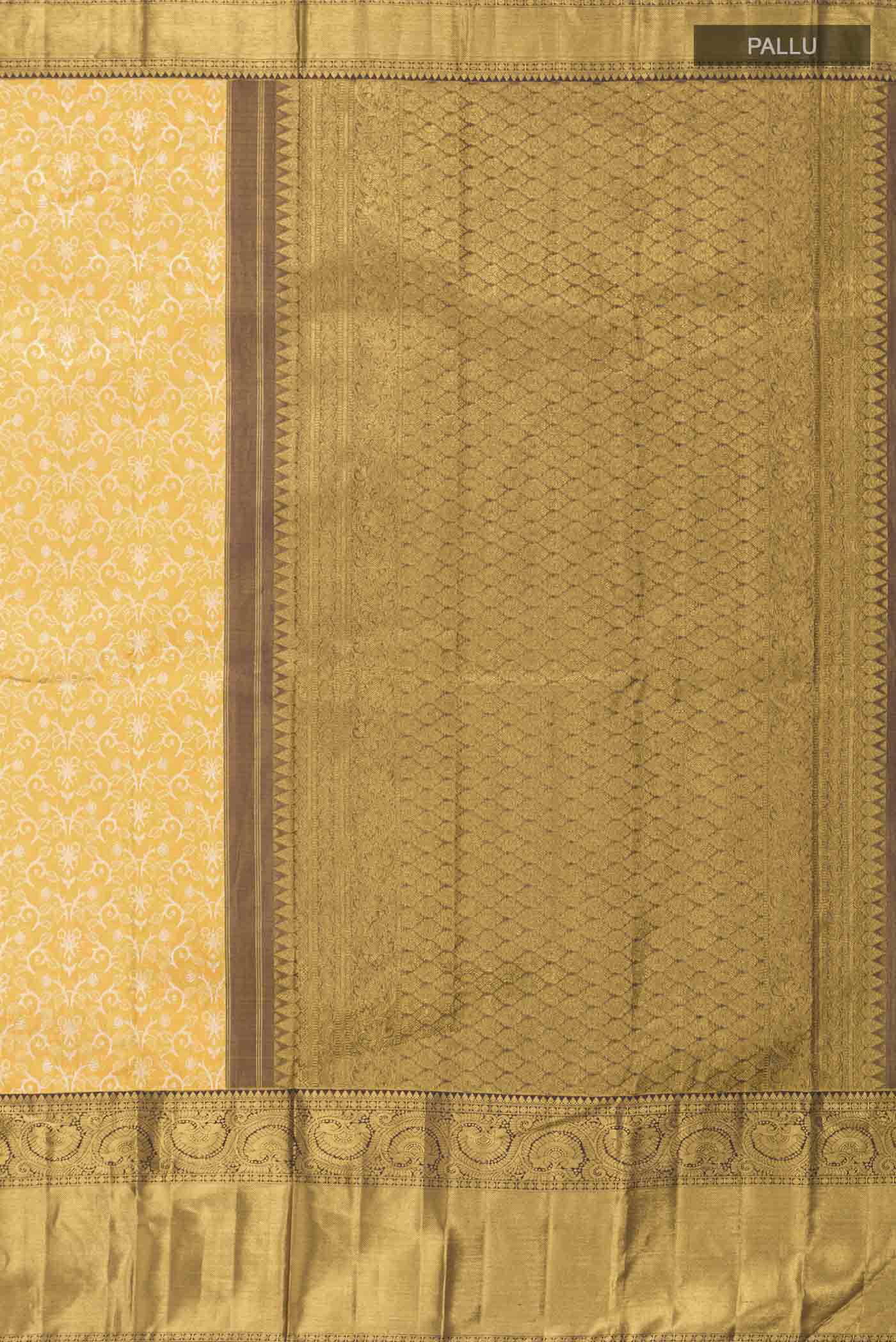 Close up image of the pallu of Pure Silk Pure Zari Yellow Kanchipuram Saree with Zari Brocade on the body and Zari Border