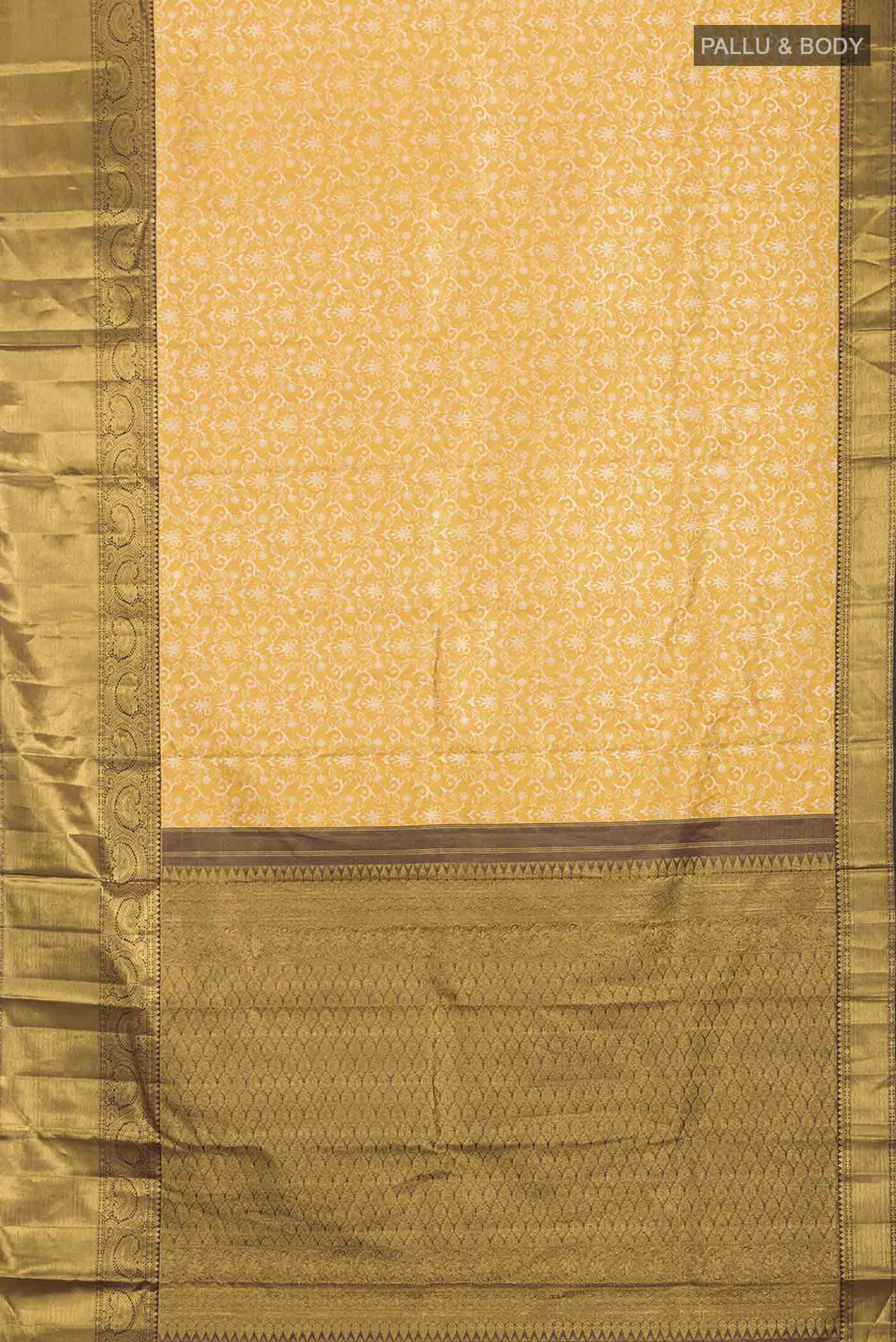 Flat view of Pure Silk Pure Zari Yellow Kanchipuram Saree with Zari Brocade on the body and Zari Border
