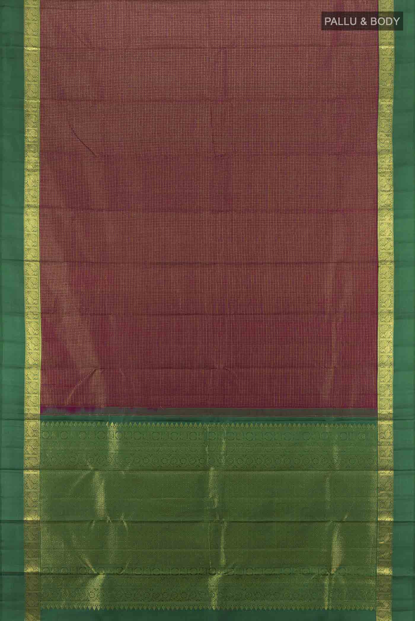Flat view of Maroon Kanchipuram Silk Saree with Zari Butta on the body and Silk Border. 