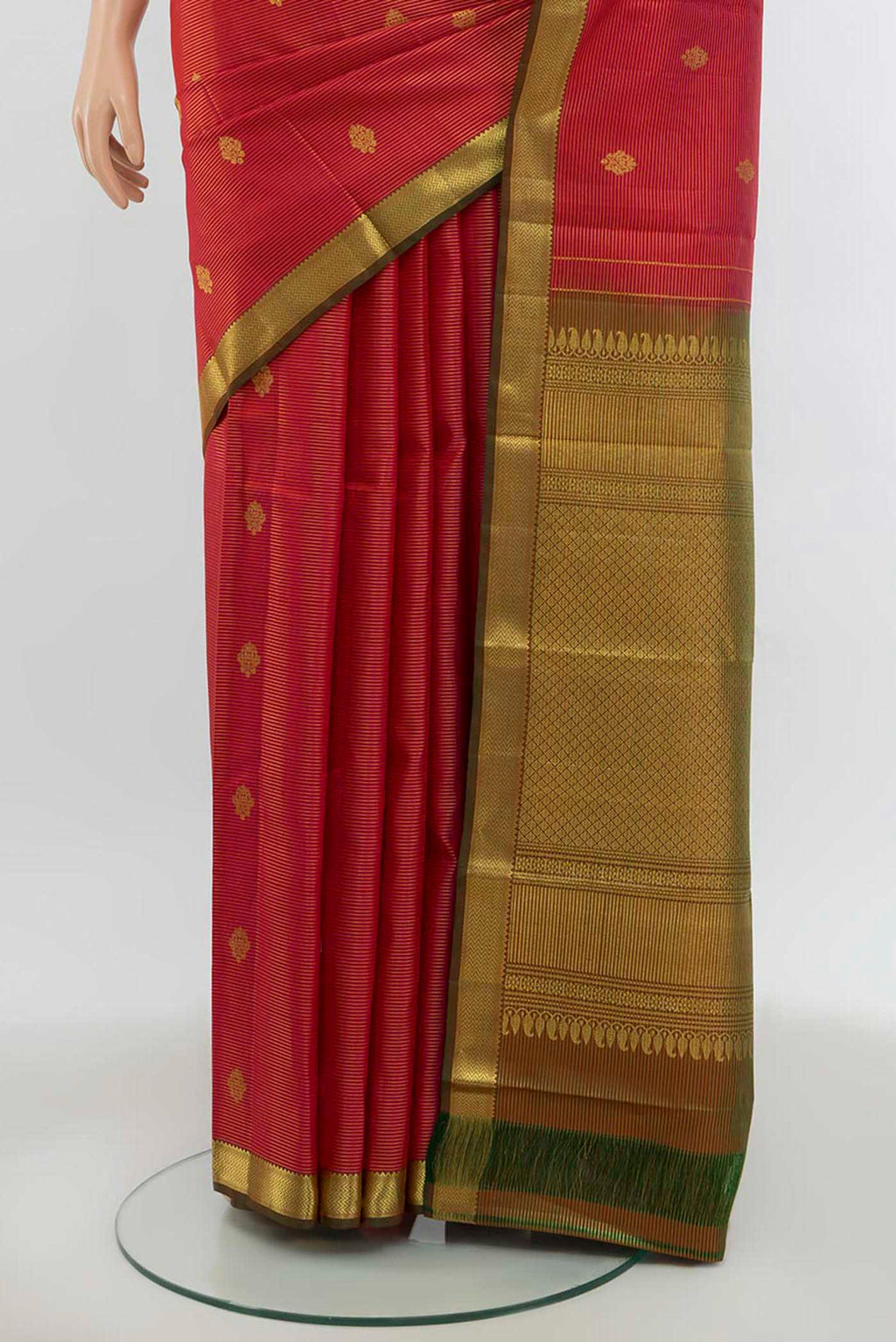 Pleats and pallu of Imperial Pink Kanchipuram Silk Saree with Zari Butta on the body and Silk Border. 