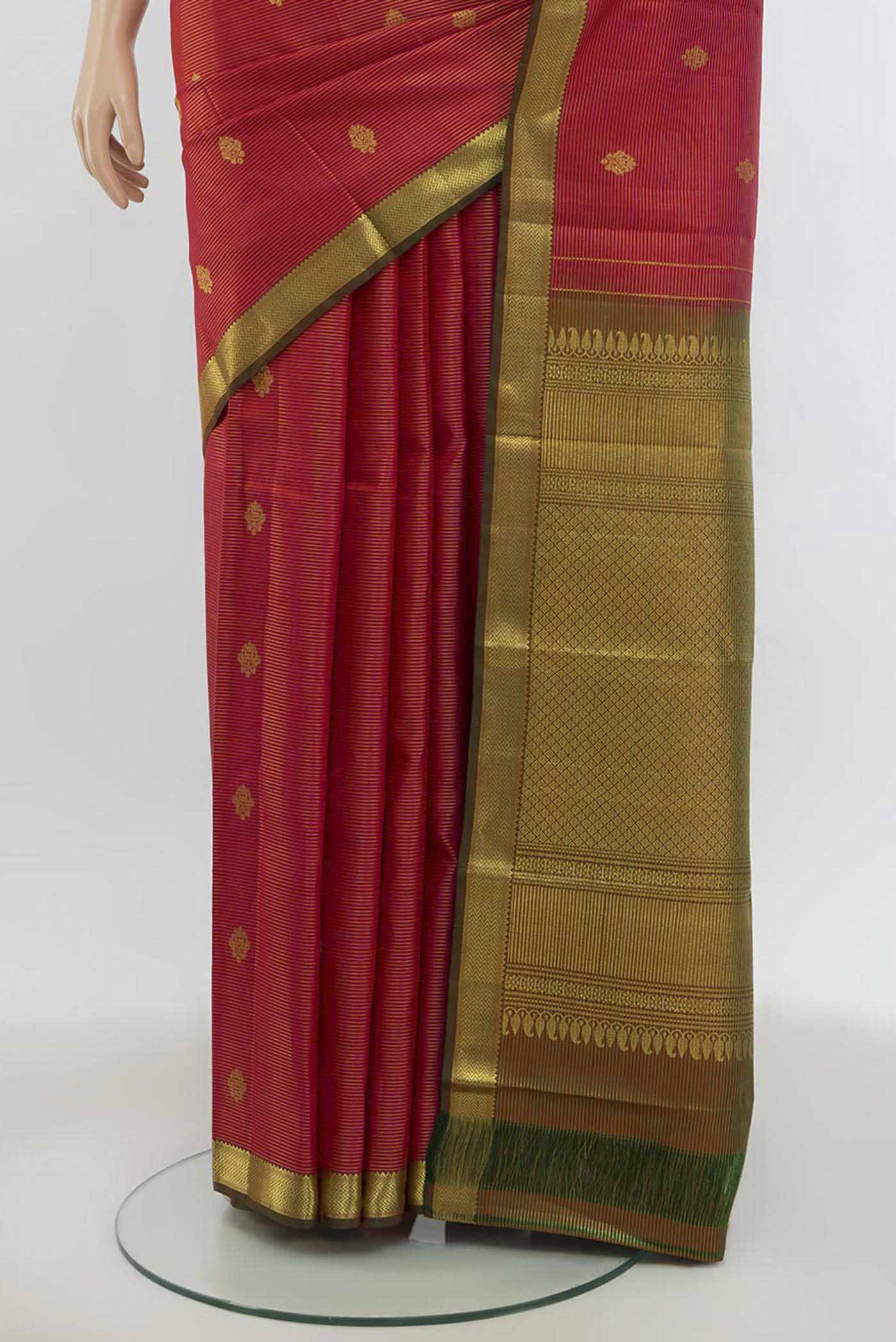 Pleats and pallu of Imperial Pink Kanchipuram Silk Saree with Zari Butta on the body and Silk Border. 