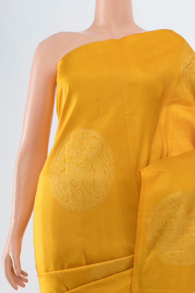 Border image of Yellow Kanjivaram Silk Saree with Zari Butta on the body and Silk Border. 