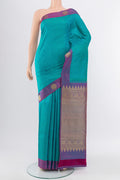 Pure Silk Pure Zari Light Blue Kanjivaram Saree with Zari Butta on the body and Silk Border.  displayed on a mannequin