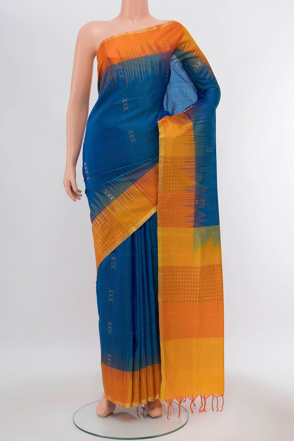 Peacock Blue Soft Silk Saree with Zari Brocade on the body and Silk Border displayed on a mannequin