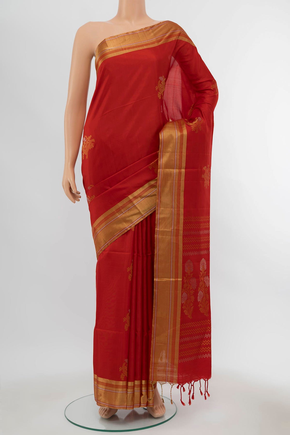 Deep Red Soft Silk Saree with Zari Butta on the body and Silk Border displayed on a mannequin