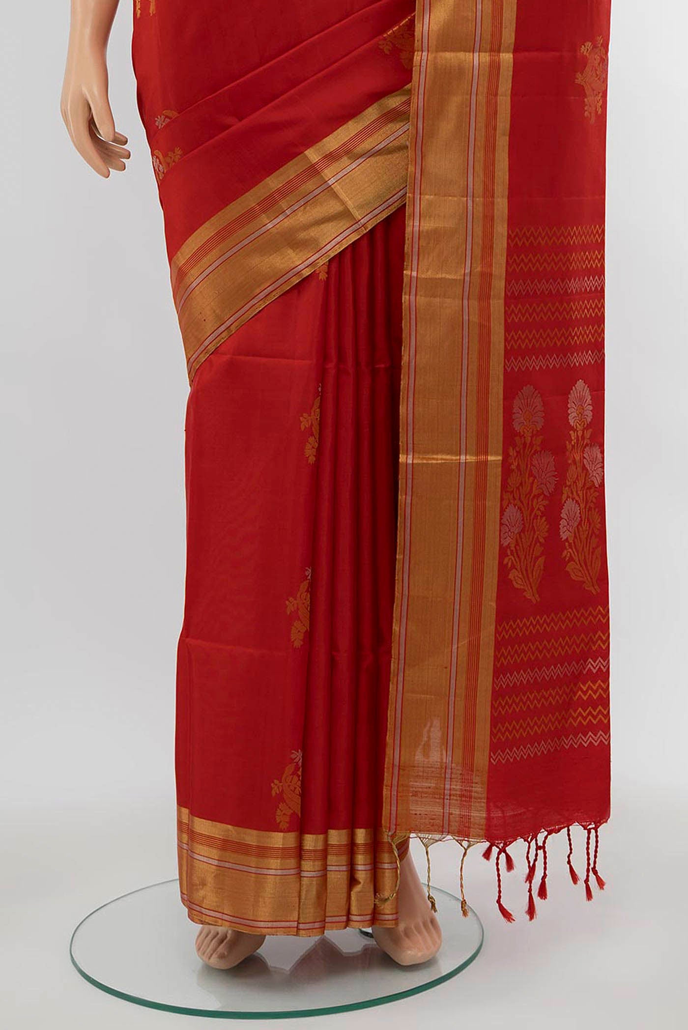 Pleats and pallu of Deep Red Soft Silk Saree with Zari Butta on the body and Silk Border