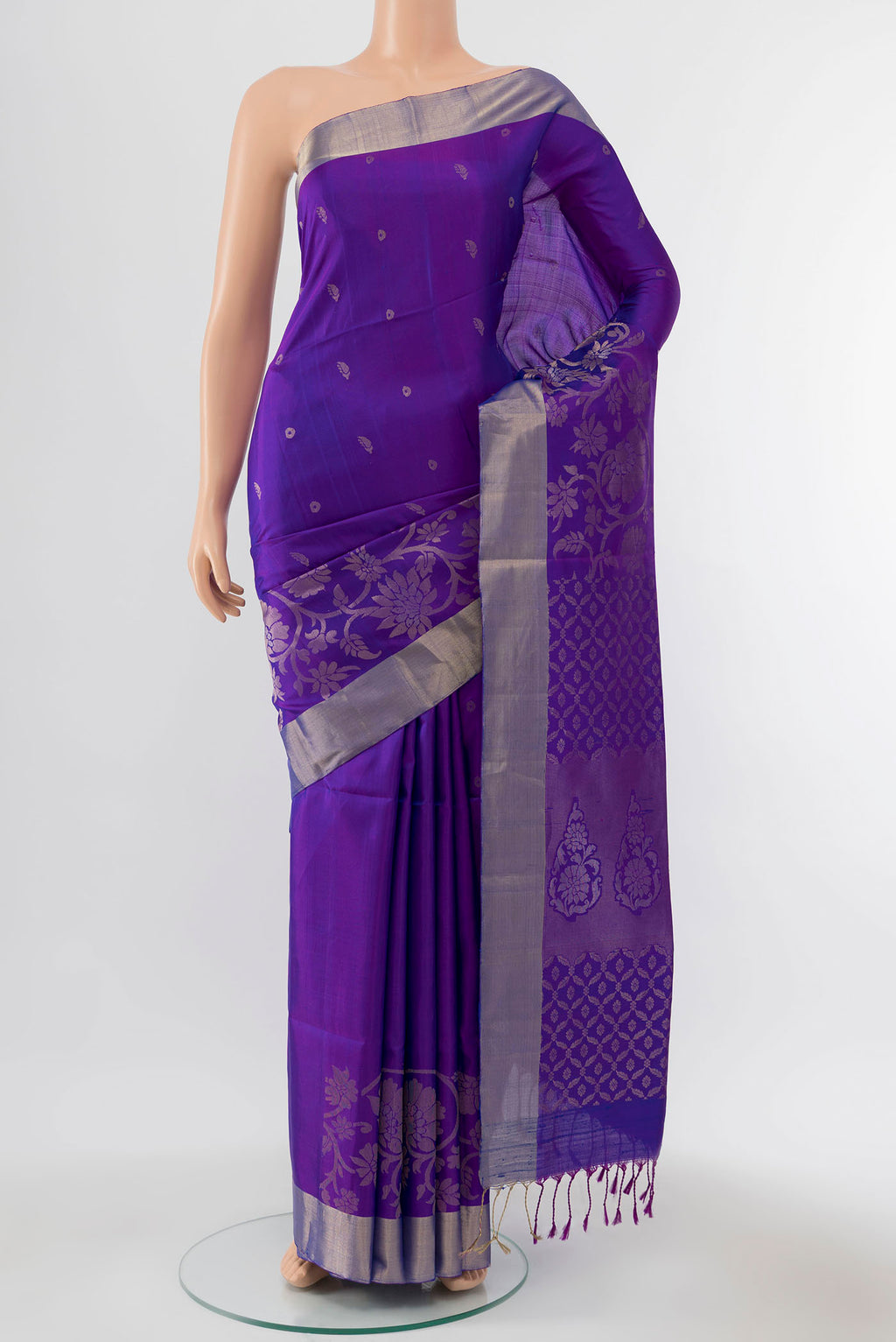 Purple Blended Soft Silk Saree with Zari Butta on the body and Zari Border displayed on a mannequin