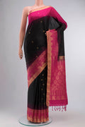 Black Soft Silk Saree with Zari Butta on the body and Zari Border displayed on a mannequin