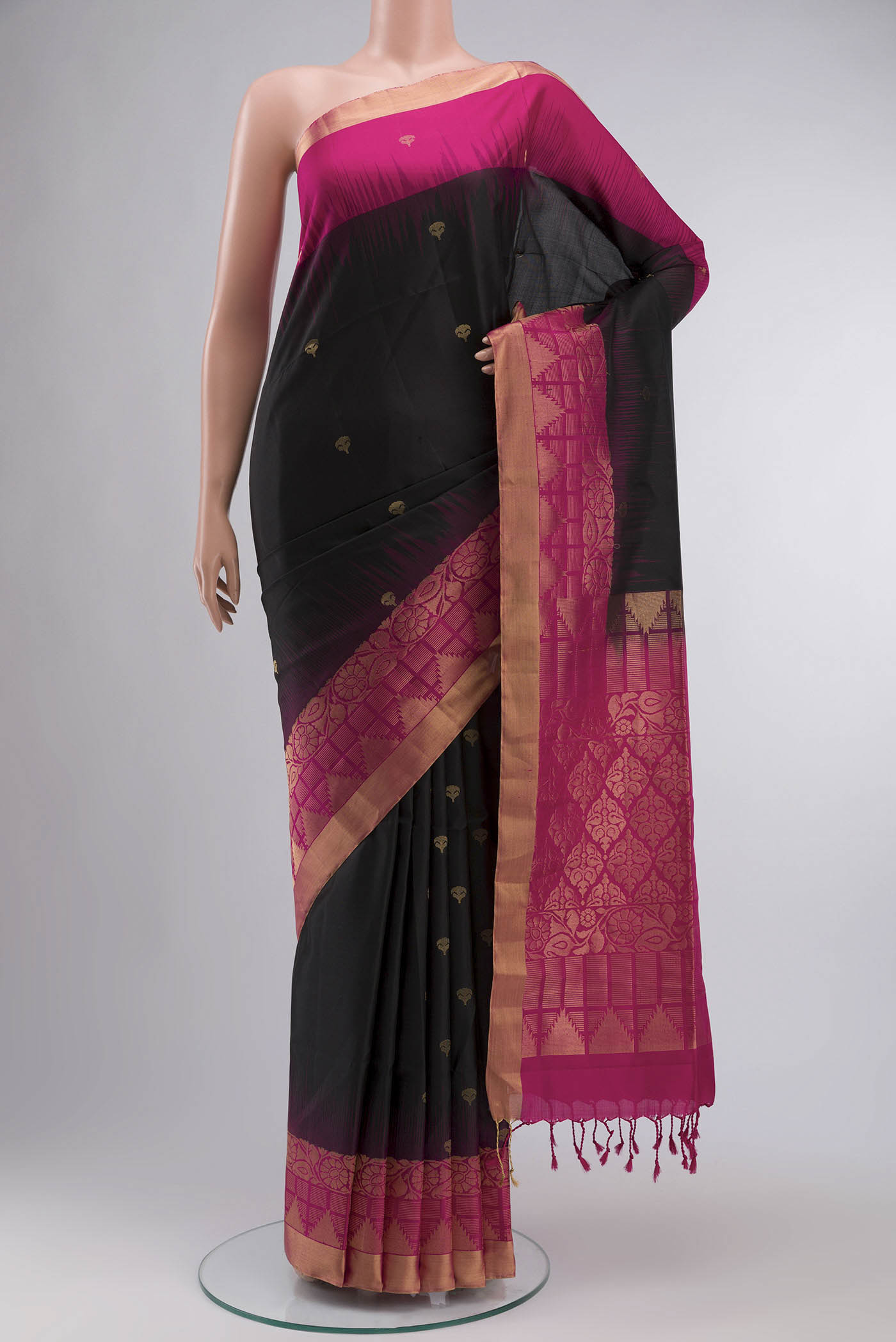 Black Soft Silk Saree with Zari Butta on the body and Zari Border displayed on a mannequin