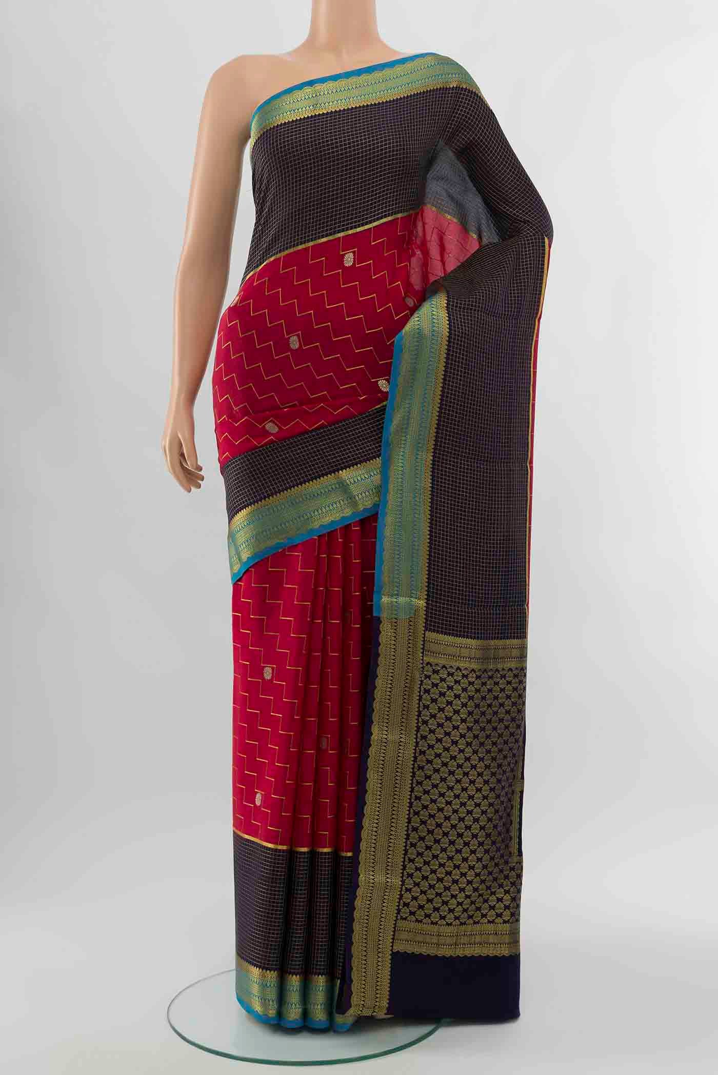 Dark Pink Mysore Crepe Saree with Zari Brocade on the body and Silk Border displayed on a mannequin