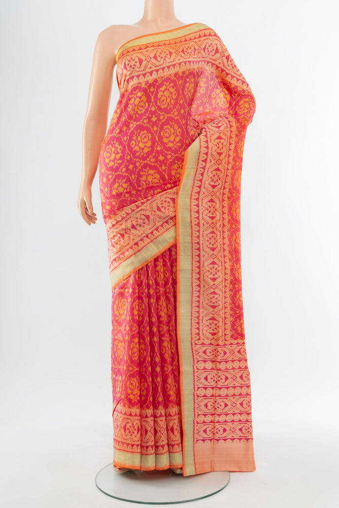 Multi Color Rajkot Patola Silk Saree with Ikat Print on the body and Silk Border.  displayed on a mannequin