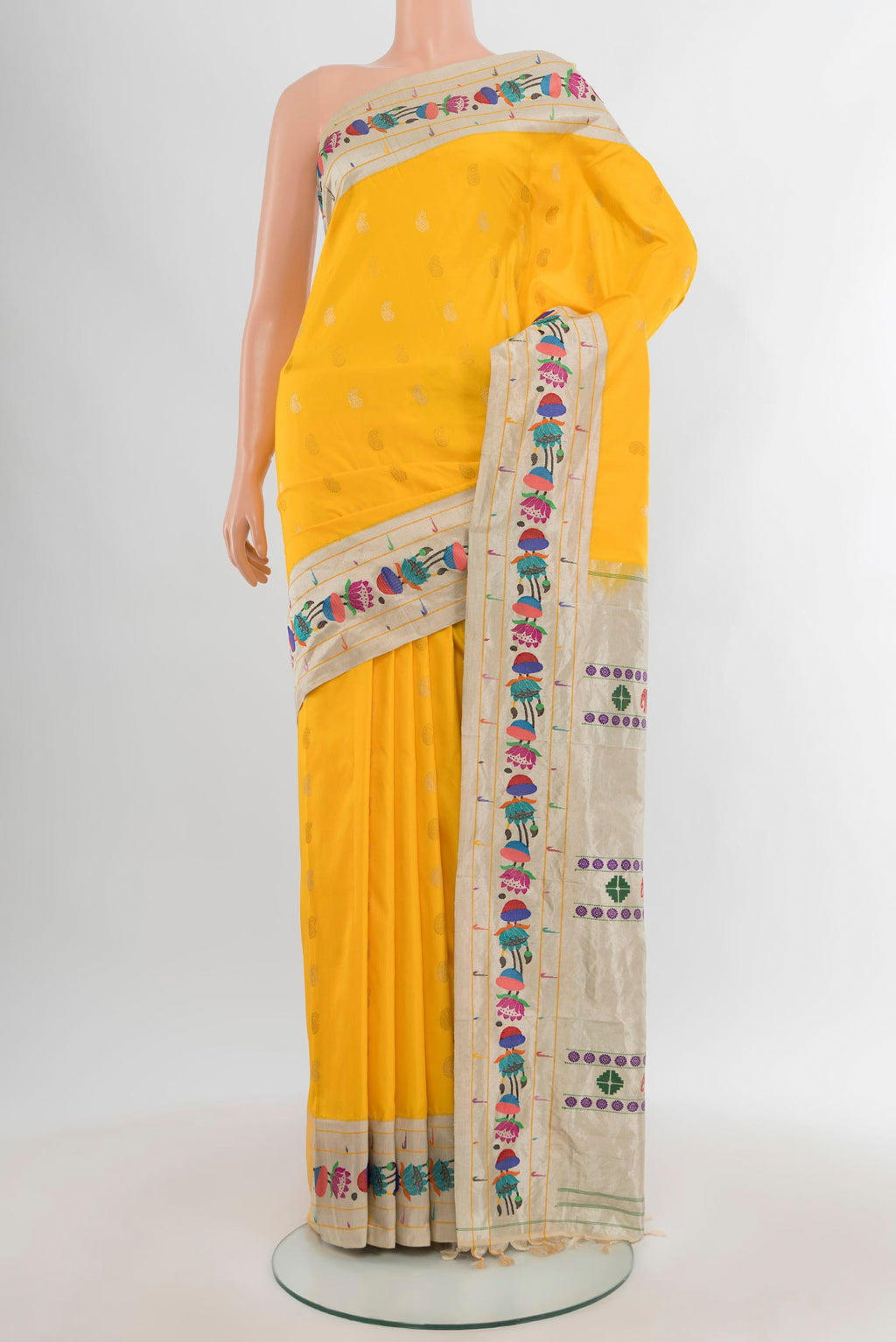 Yellow Gadwal Silk Saree with Zari Butta on the body and Paithani Border.  displayed on a mannequin
