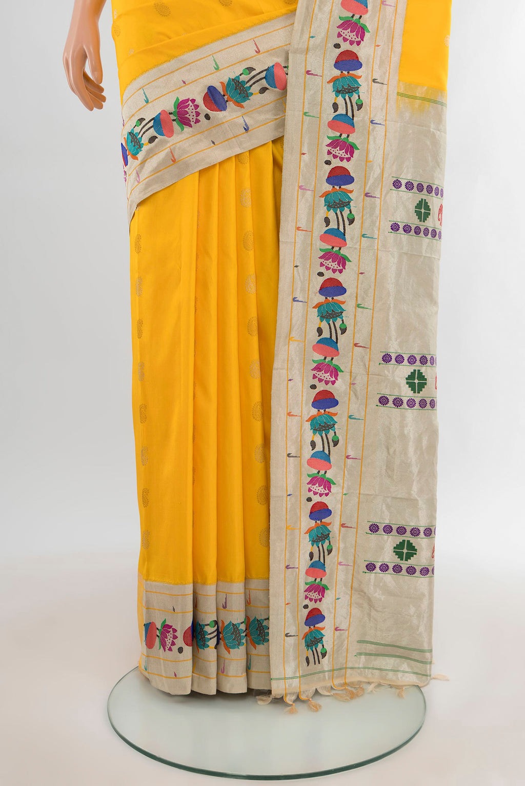 Pleats and pallu of Yellow Gadwal Silk Saree with Zari Butta on the body and Paithani Border. 