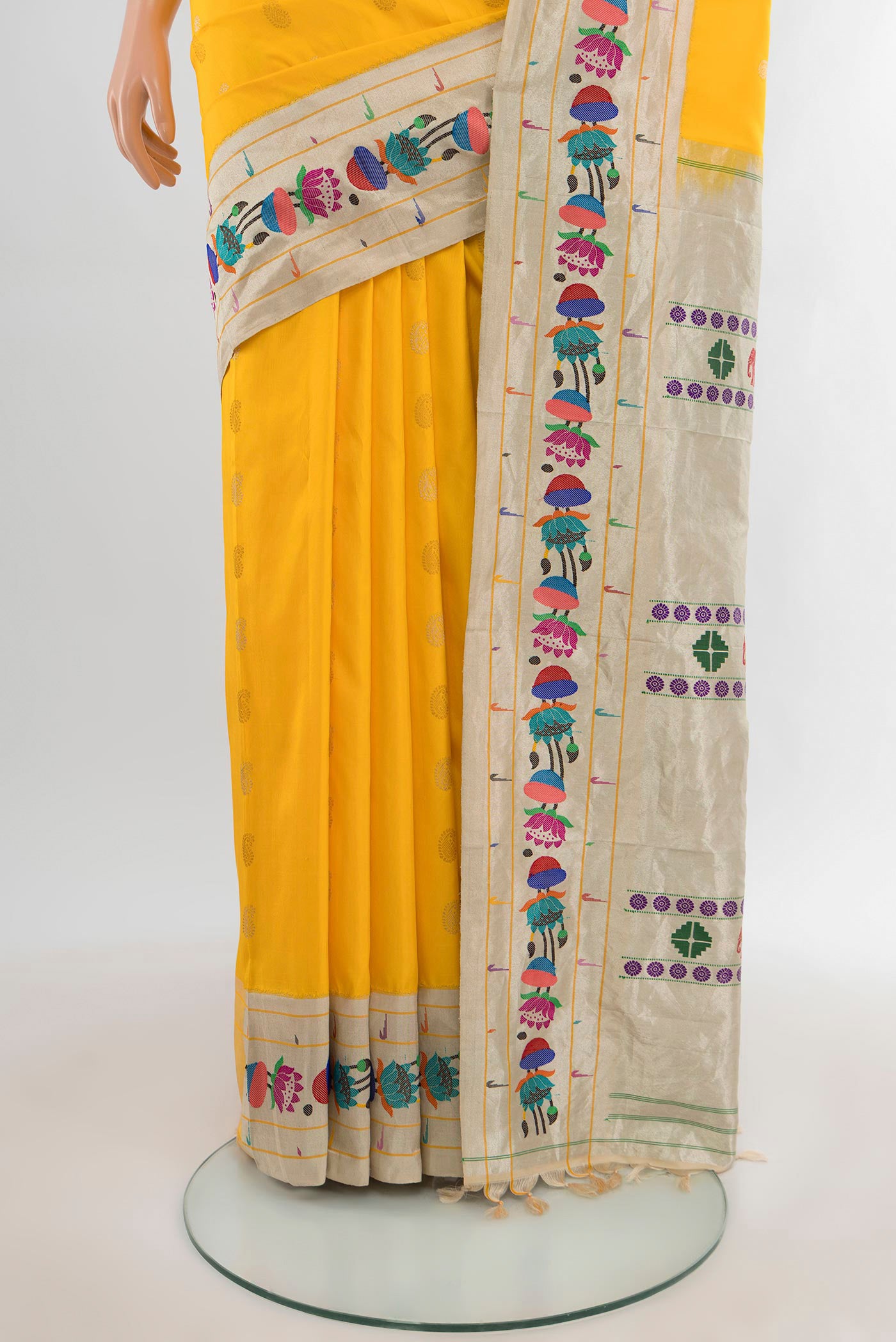 Pleats and pallu of Yellow Gadwal Silk Saree with Zari Butta on the body and Paithani Border. 
