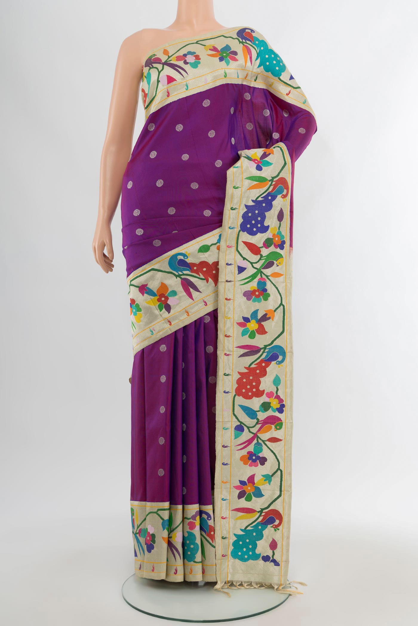 Purple Gadwal Silk Saree with Zari Butta on the body and Paithani Border.  displayed on a mannequin