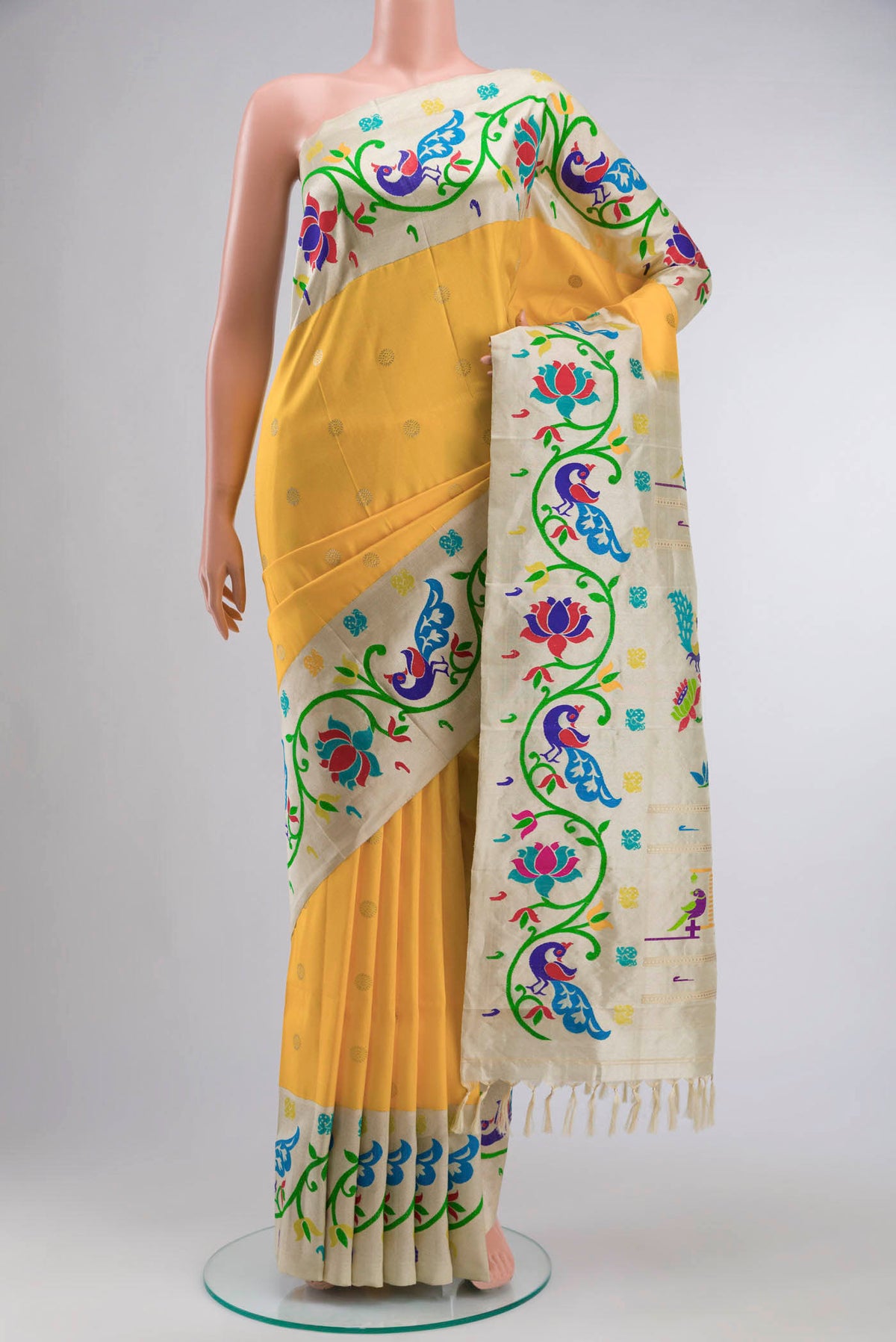 Yellow Paithani Silk Saree with Zari Butta on the body and Zari And Thread Border displayed on a mannequin
