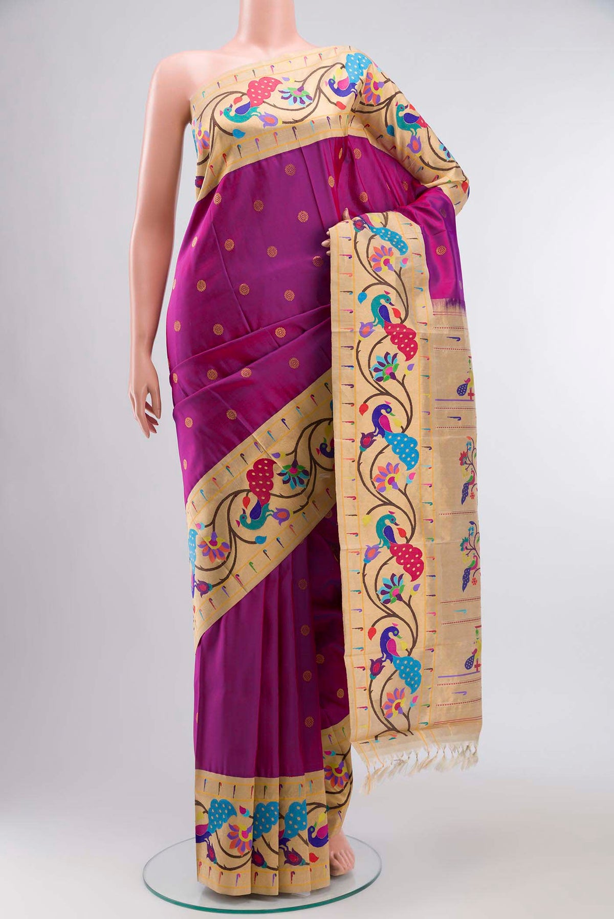 Pure Silk Pure Zari Magenta Gadwal Saree with Zari Butta on the body and Paithani Border displayed on a mannequin